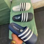 Image of Different Color Adidas Slides